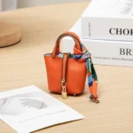 Colgante de Mini Bolso Creativo de Cuero diseñador Colgante de Bolso - Imagen 2